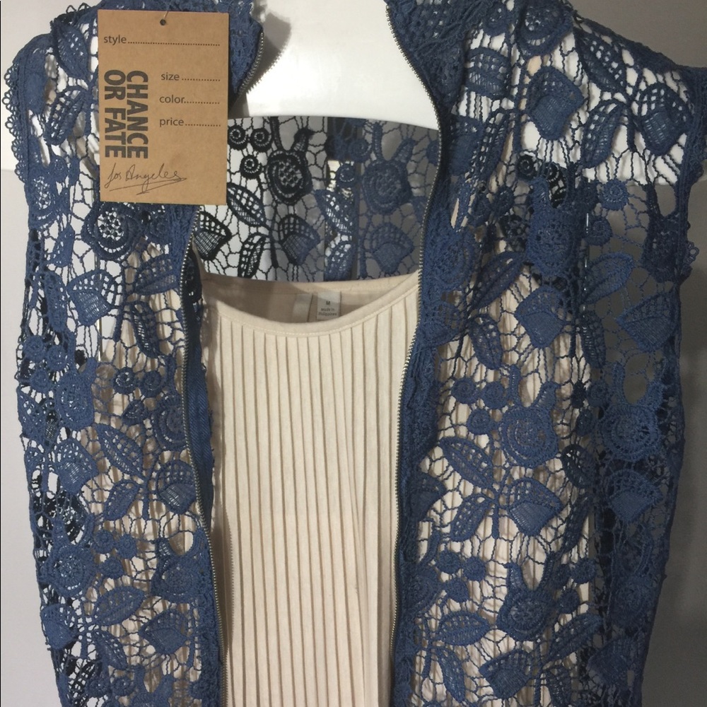 Sleeveless blue lacy vest